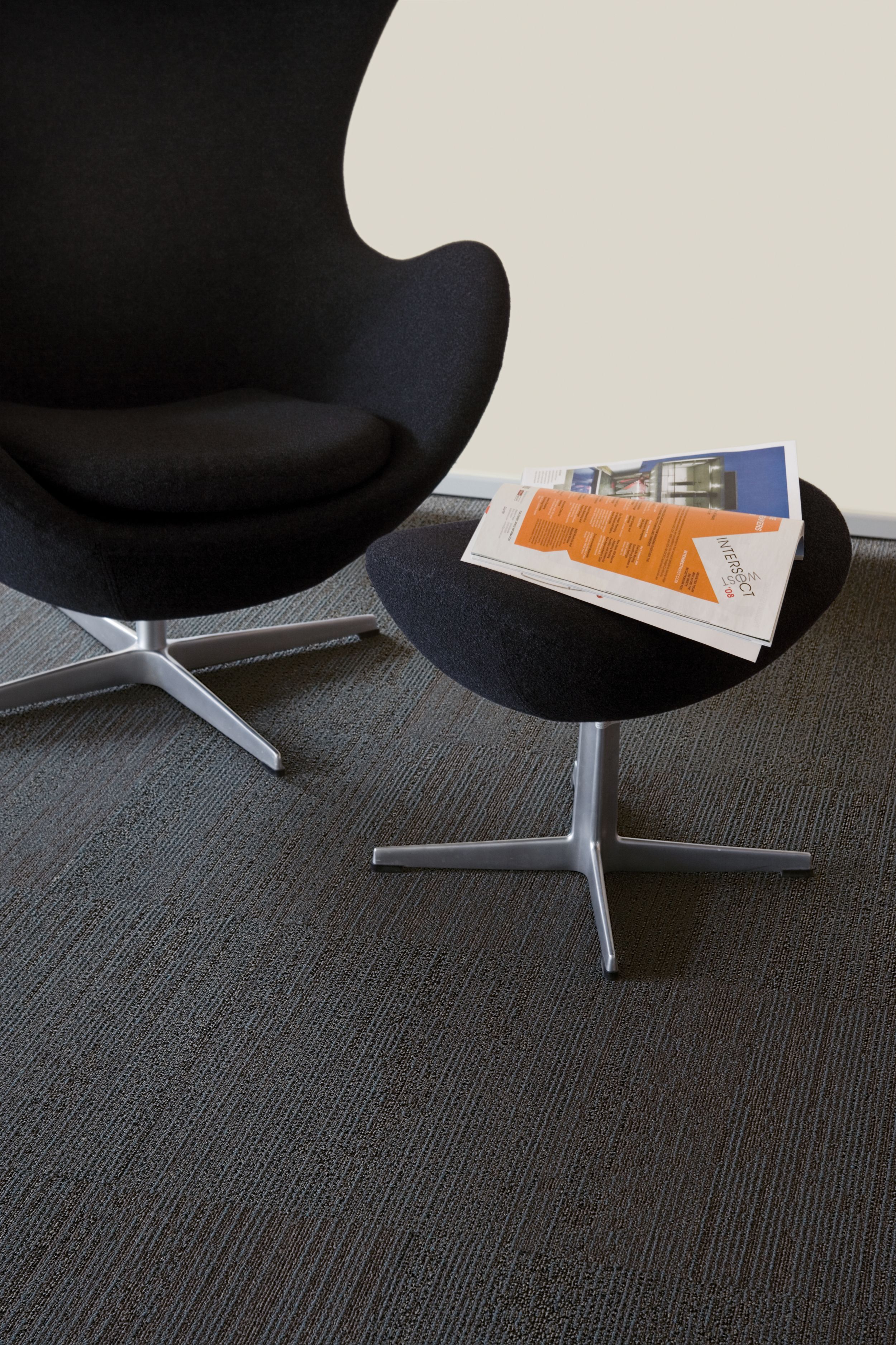 Detail of Interface San Roco carpet tile with chair and ottoman imagen número 2